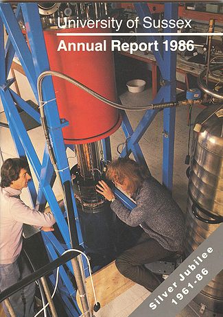 Installing the new TLM cryomagnetic system (referred to above) in 1985,                                                                                                      as featured on the Silver Jubilee edition of the University of Sussex                                                    Annual Report 1986, the picture shows Mike Springford and Paul Reinders.